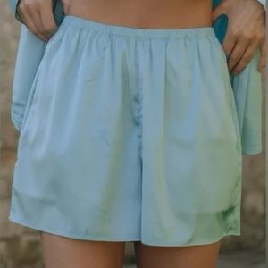 DAILY DRILLS silky light blue shorts // size medium